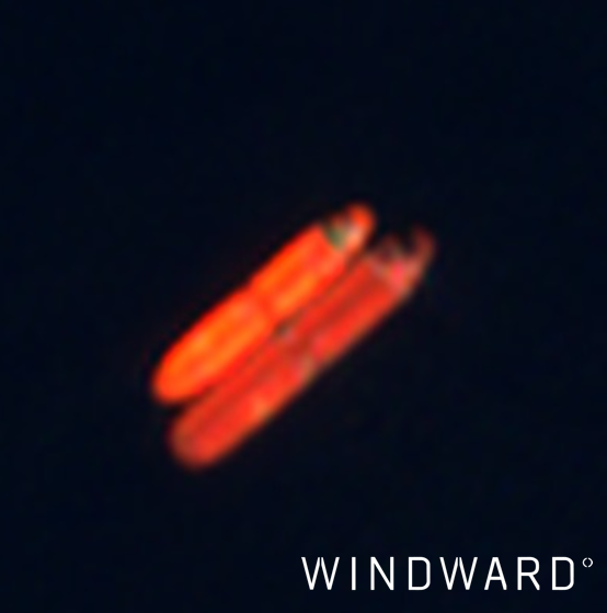 An EO image capturing a ship-to-ship transfer between two vessels during a period when both were operating with AIS switched off. The dark STS event was not visible in any AIS record, but the imagery provides direct visual evidence of what occurred. Source: Windward Maritime AI™ Platform.